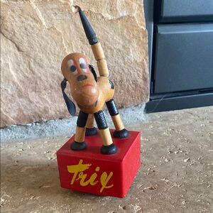 Antique 1930s Trix Wooden Rare push-up puppet toy Red base yellow lettering
